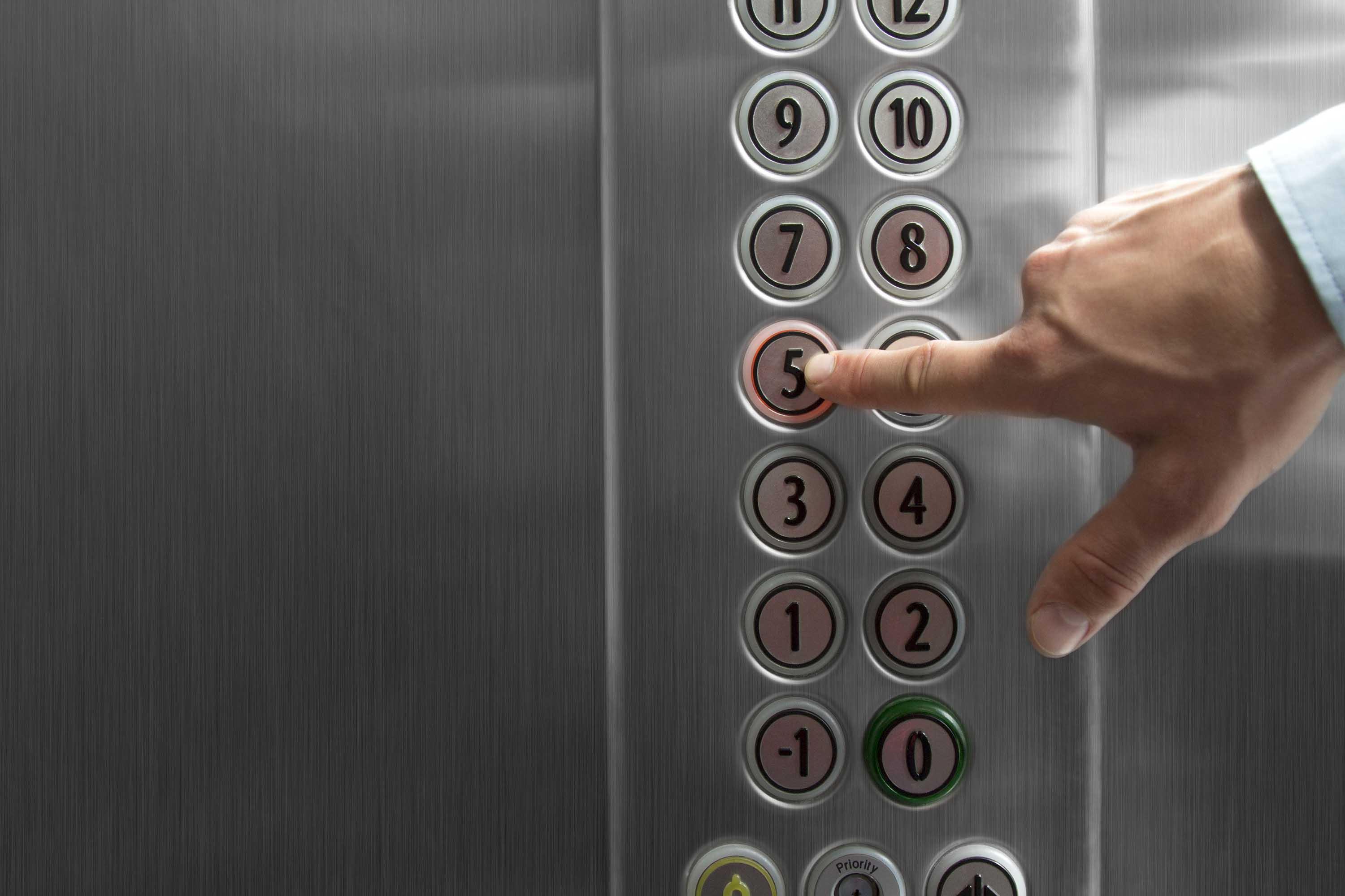 I got stuck in an elevator for four hours with a man who didn't speak English, but he shared his flask of liquor.